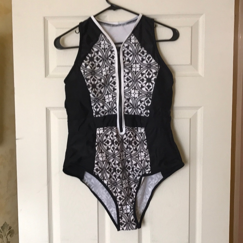 Black and white zip up one piece